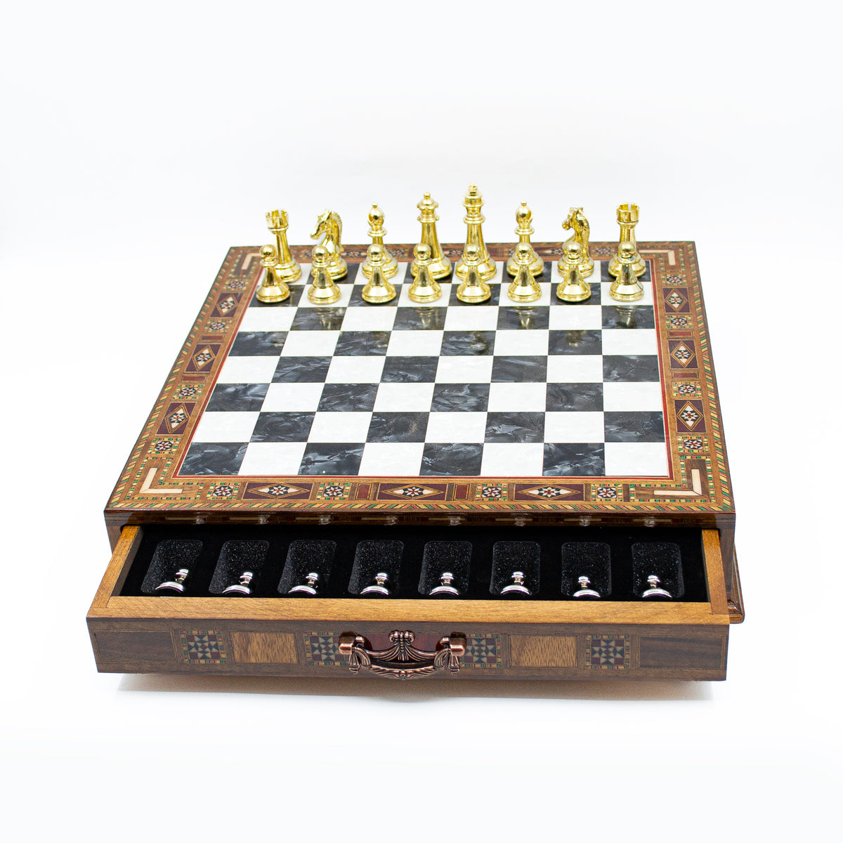 Close-up of the chess pieces and wooden board with drawer – Chess studio