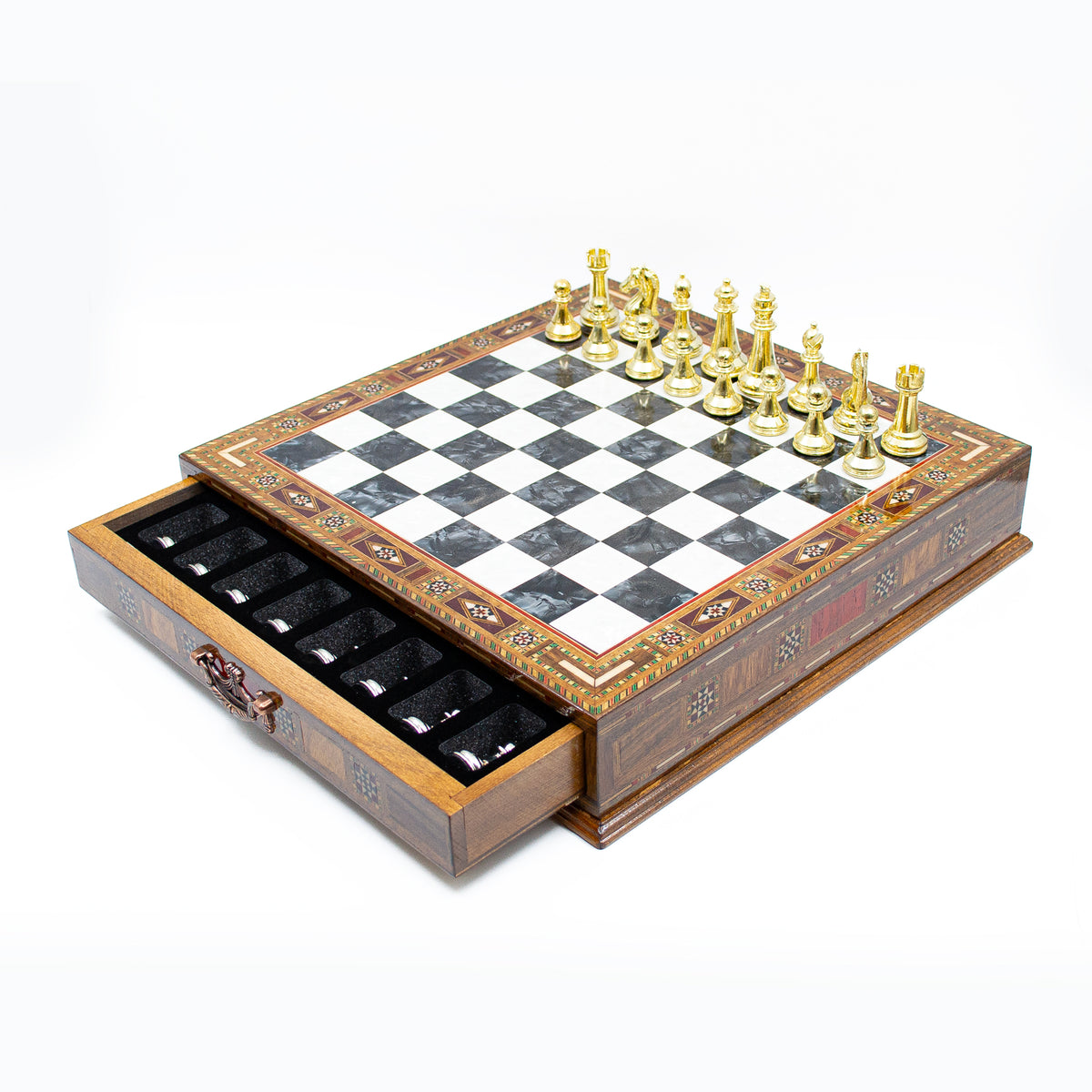 Open chess set with metal pieces in the storage compartment – Chess atelier